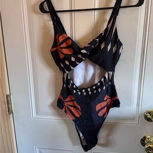 Cut out one piece swim suit size small